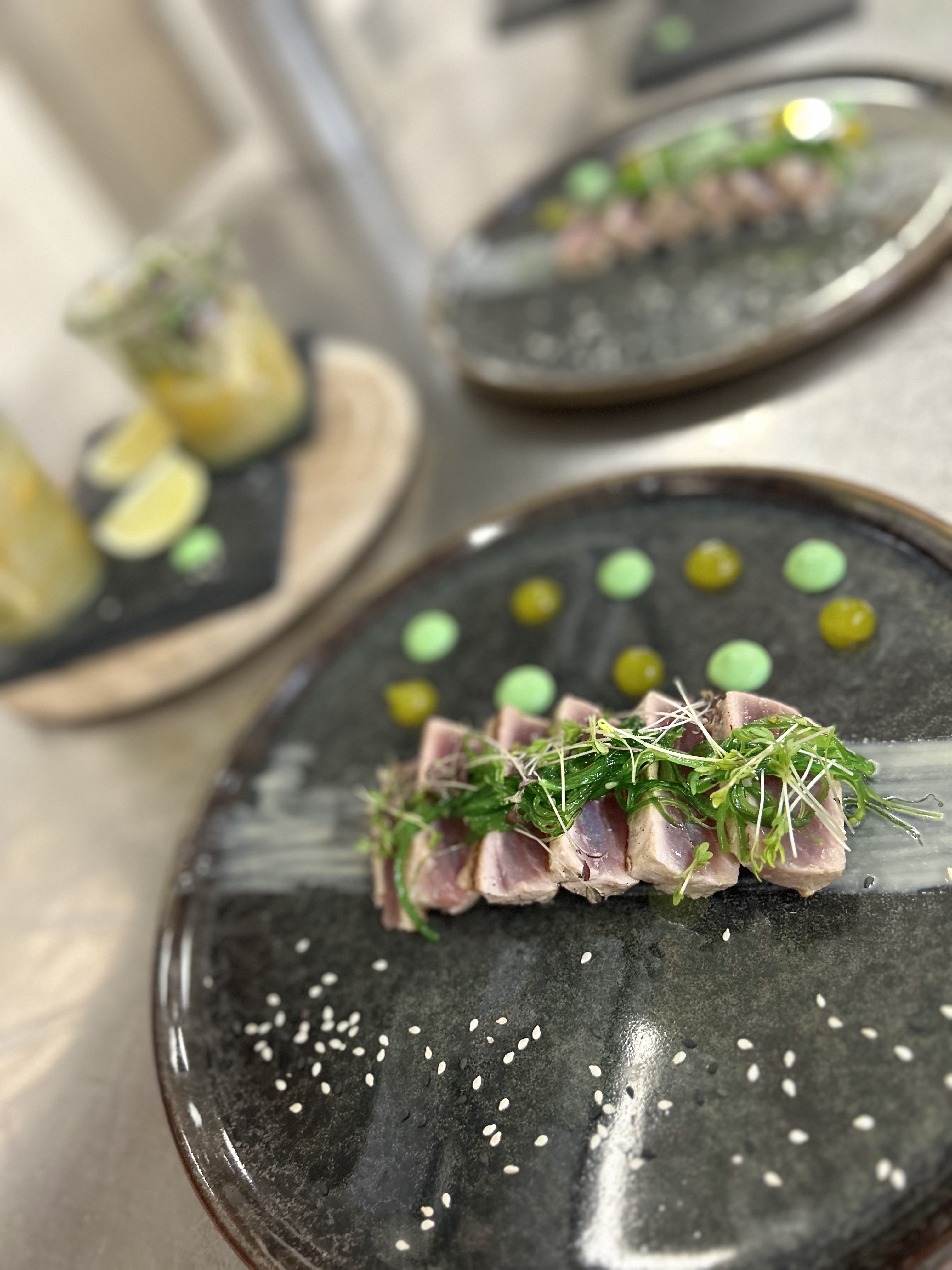 Seared tuna with sea greens and herb dressing